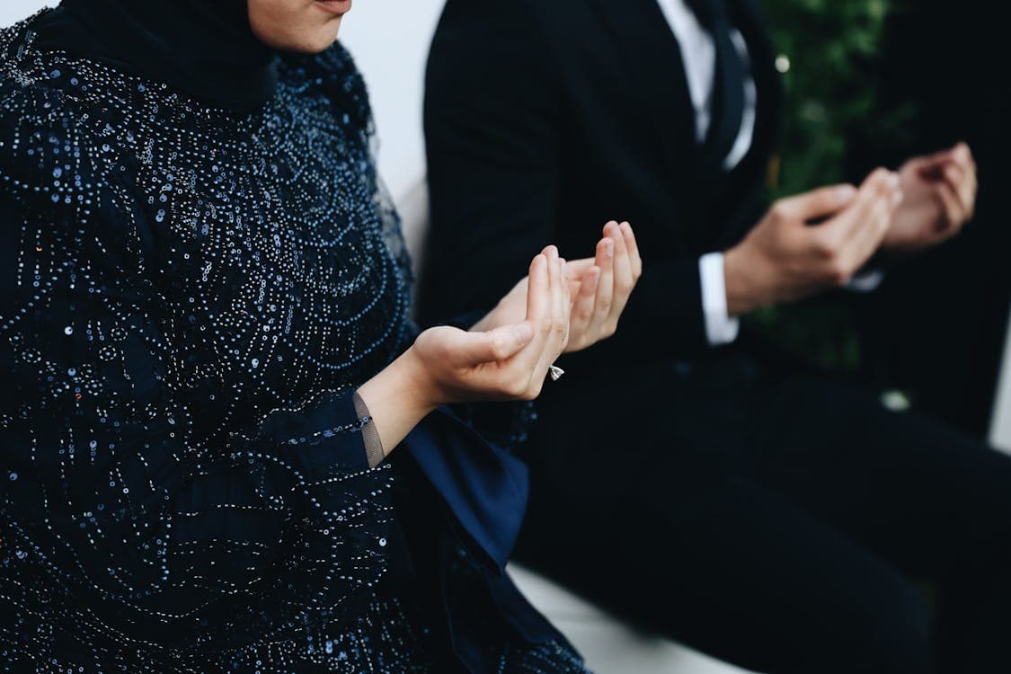 Muslim couple praying